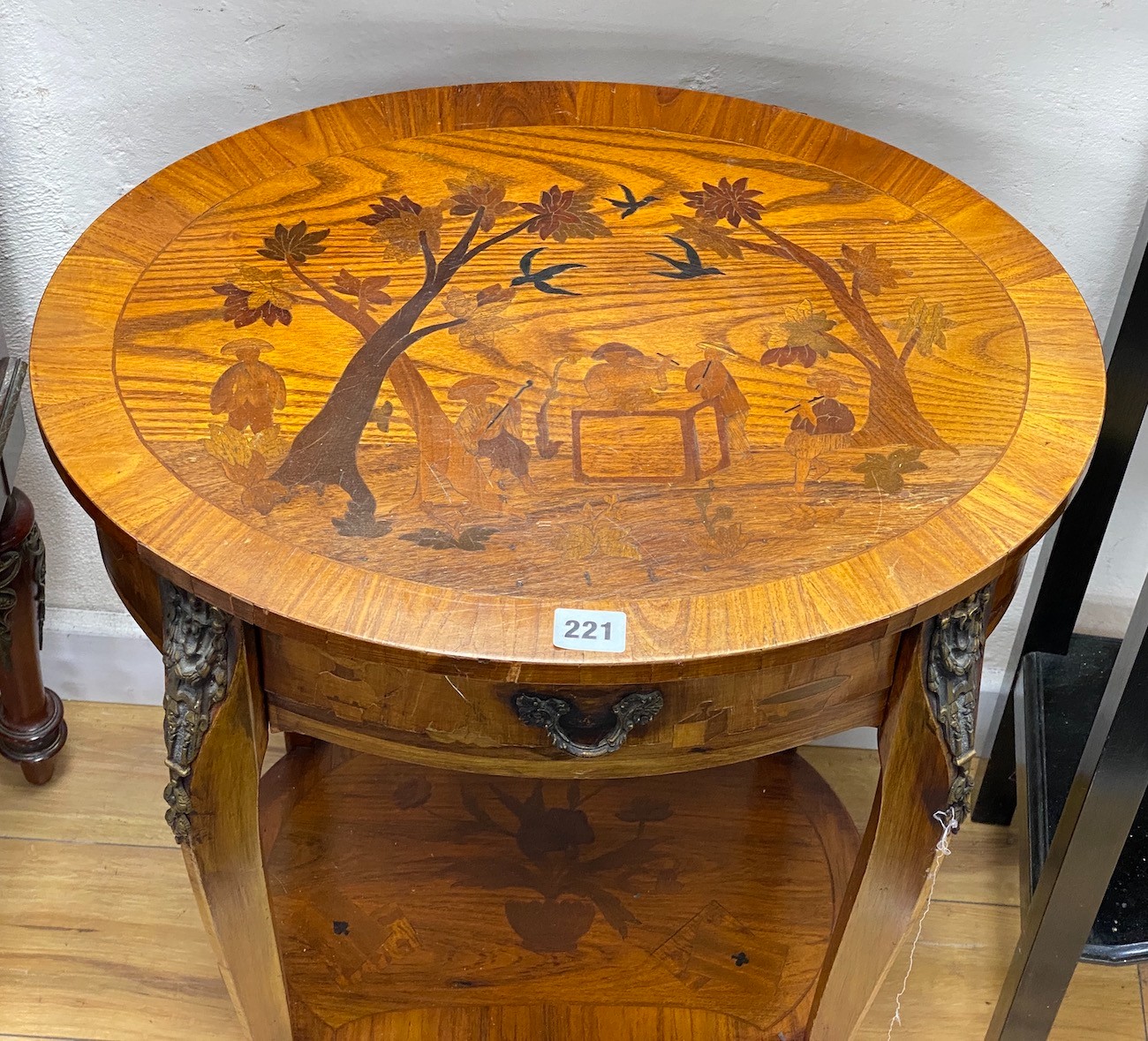 A reproduction oval French two-tier parquetry inlaid occasional table, width 52cm, depth 40cm, height 70cm